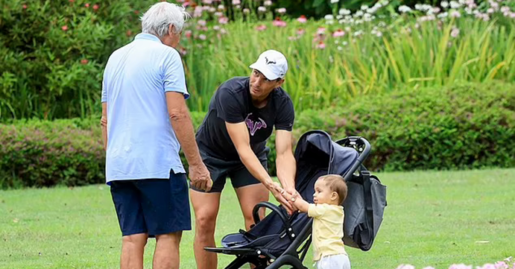 Like father, like son! A beaming Rafael Nadal gives his baby boy Rafa Junior a tennis racquet and dotes on the one-year-old in Australia