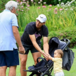 Like father, like son! A beaming Rafael Nadal gives his baby boy Rafa Junior a tennis racquet and dotes on the one-year-old in Australia