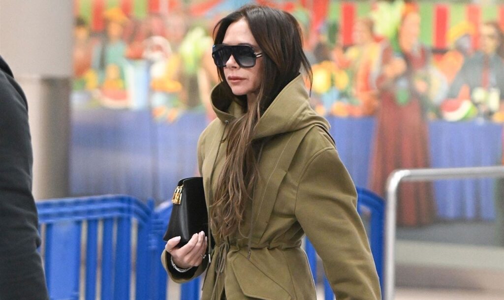 Victoria Beckham Travels In Spandex Pantaboots – Because The Airport Is Her Runway